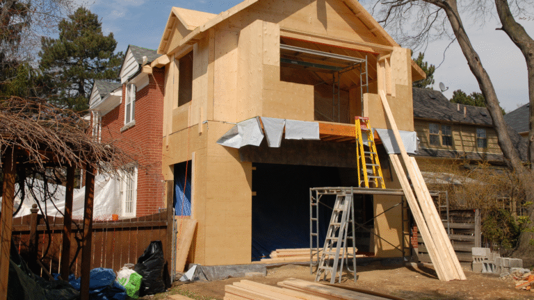 Double-storey house extension above a garage in South West Devon