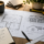 Architectural drawings and house extension plans on a desk, representing the planning stage of a home extension project in Newton Abbot.